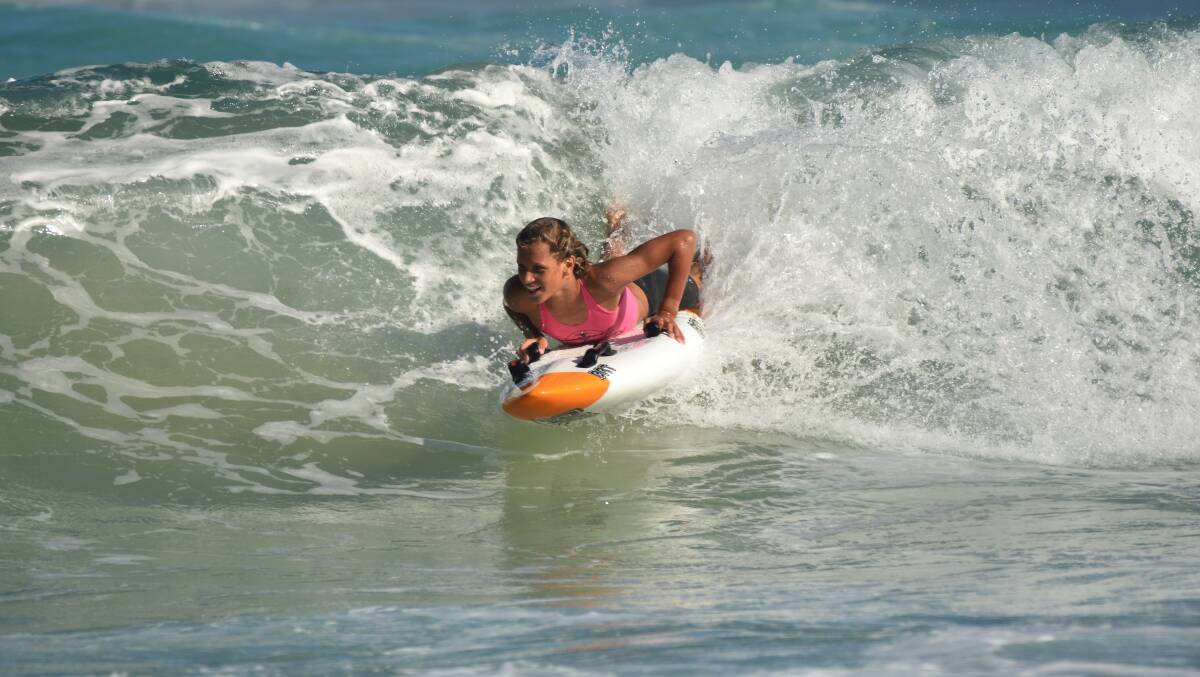 Final wave: Tyse Thrower held on to win gold at the surf life saving state titles on Sunday. Photo: Paul Jobber