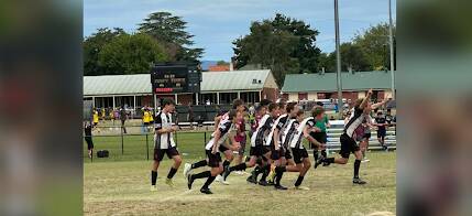 Mid Coast FC celebrate their under-15 boys Bathurst Cup win. Picture supplied by Jenny Mercer