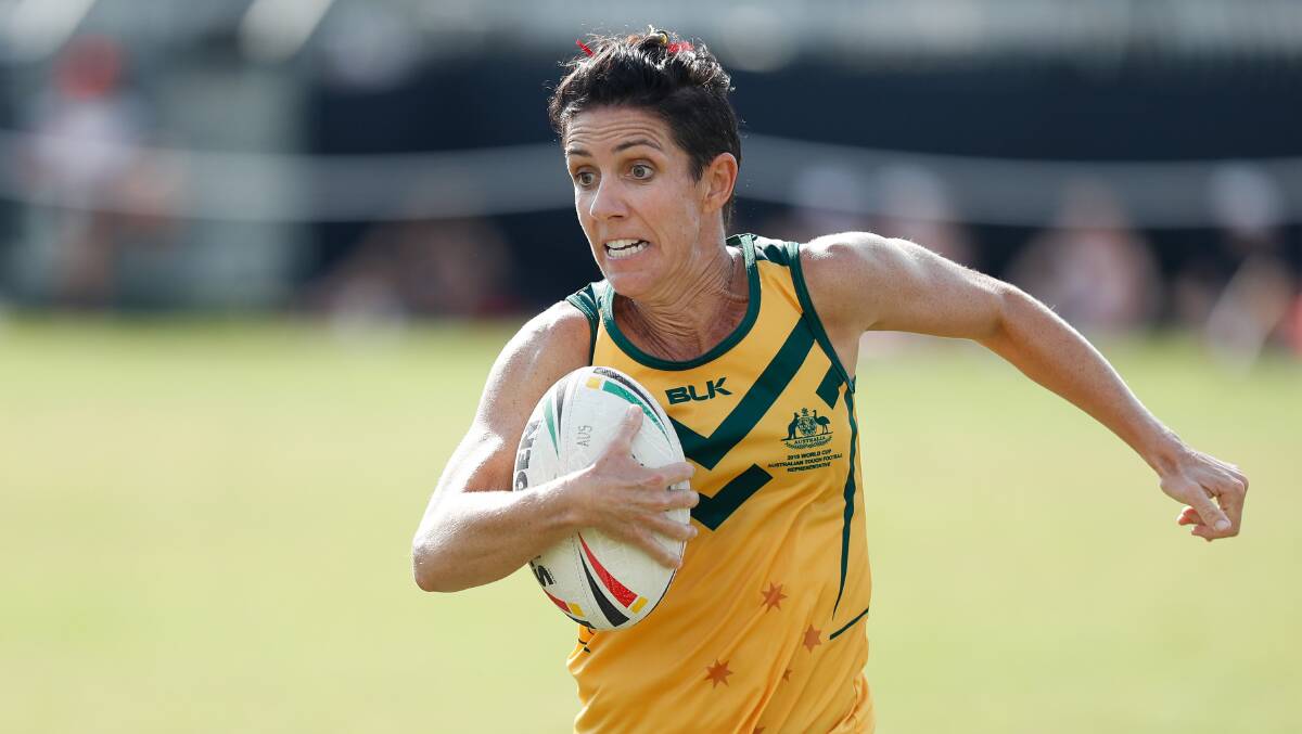 On song: Anna Gleeson in action for Australia at the Touch Football World Cup in Malaysia. Photo: Aisle 5 Photography