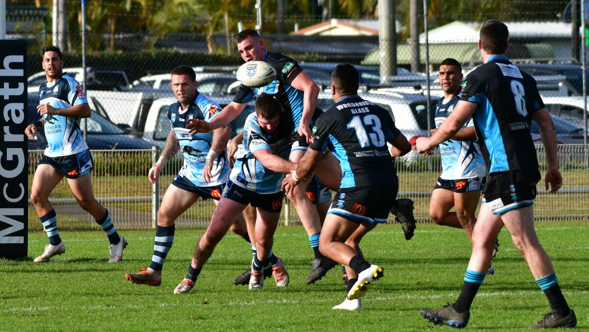 Pass it: Lee Price gets an offload away against Port City earlier this year.