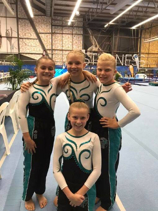 Raising the bar: Gymnasts return after strong state title showing