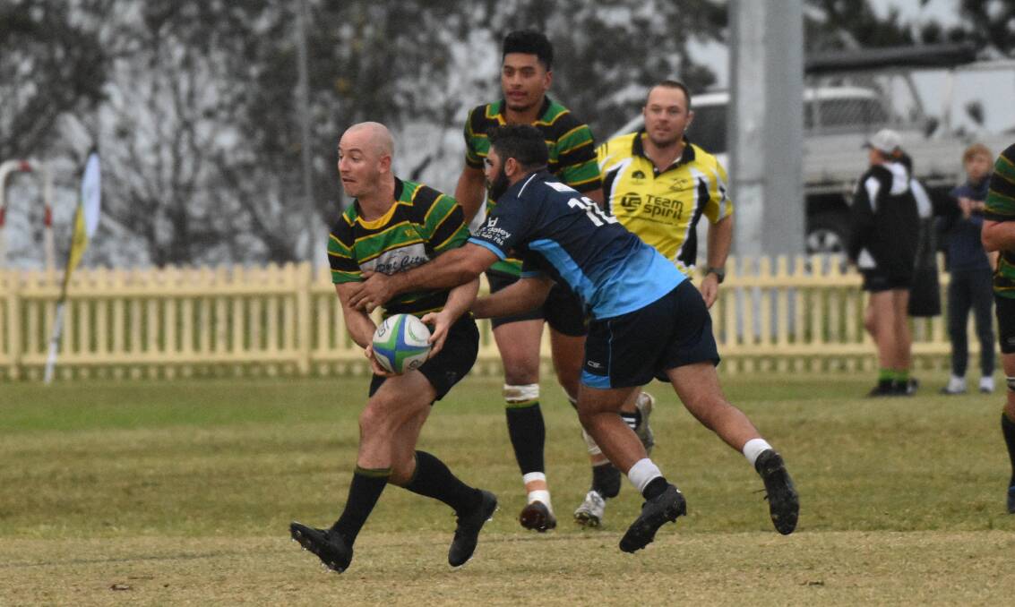 Strong performance: Adam McCormack gets a pass away in Hastings Valley's win on Saturday. Photo: Tracey Fairhurst