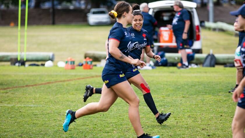 Gotcha: Simone Smith races teammate Isabelle Kelly at training. Photo: supplied