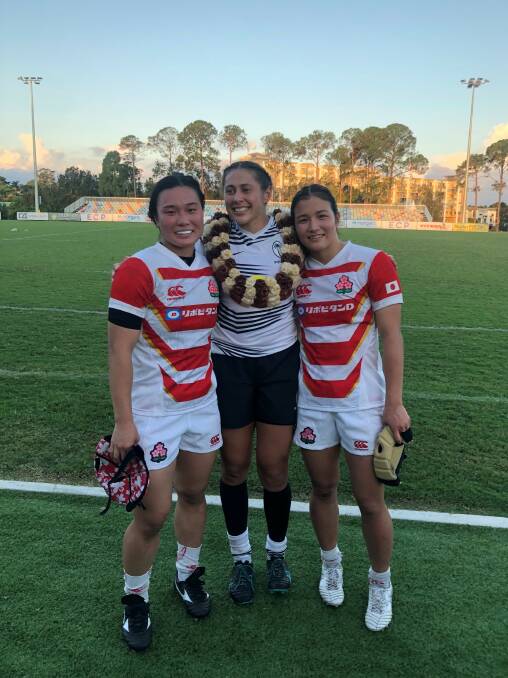 Talei Qalo Wilson (centre) with her ACT Brumbies teammates following her debut for Fiji against Japan on May 1. Photo: supplied