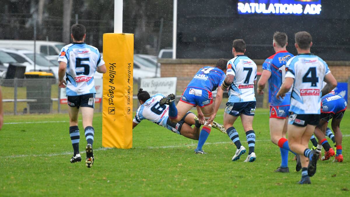 Try time: Stephan Blair crashes over for the Breakers.