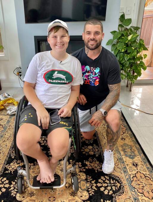 House visit: Jake Spurdle and South Sydney Rabbitohs star Adam Reynolds. Photo: supplied