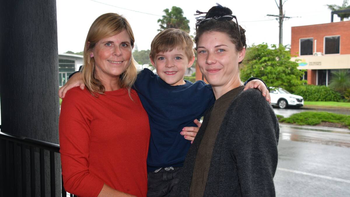 Positive outcome: Angie, Ryan and Mikaela Priest after her flood rescue on March 20. Photo: Paul Jobber