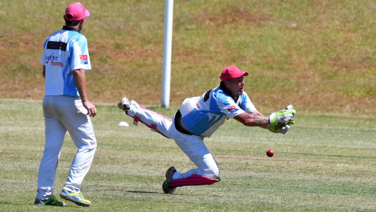 Oops: Port City captain Gordon Scott can't get a glove to this chance against Macquarie last week. Photo: Ivan Sajko