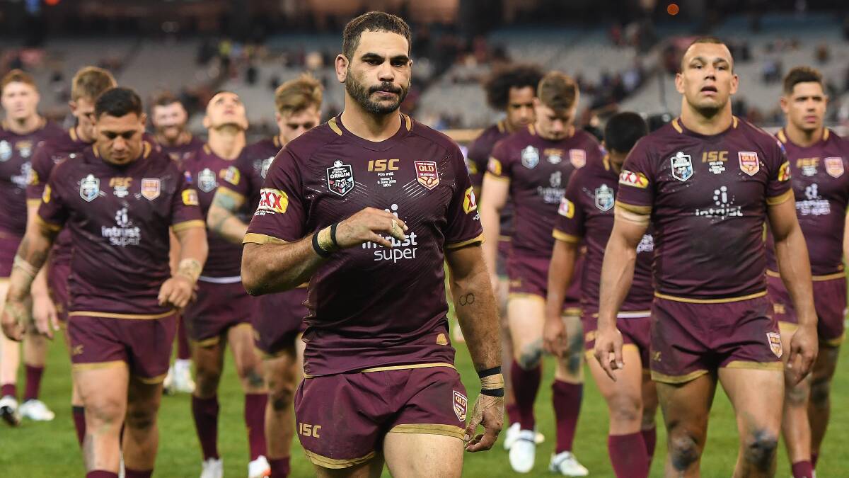 Hurting: Greg Inglis and the Maroons will look to keep the 2018
State of Origin series alive in Sydney on Sunday. Photo: AAP/Julian Smith