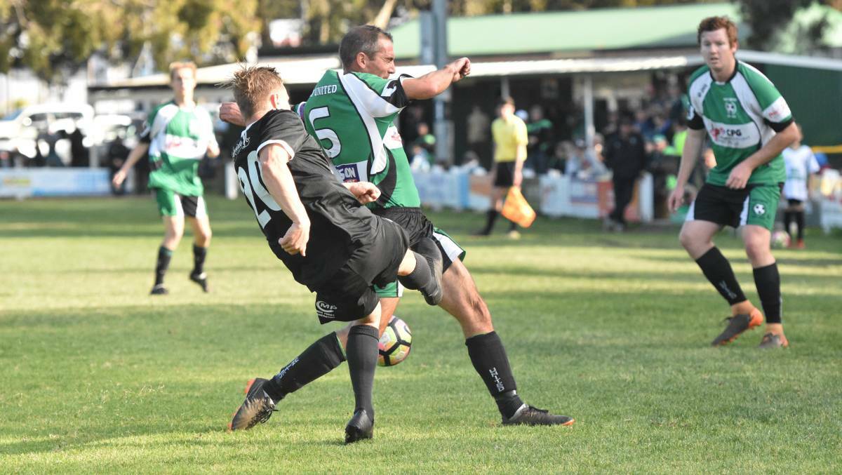 Hang in there: Football Mid North Coast have pushed the start of their community football season back until May. Photo: Paul Jobber