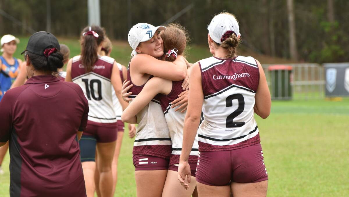You beauty: Manly players celebrate their 2020 NSW Junior State Cup under-18 girls northern conference title win.