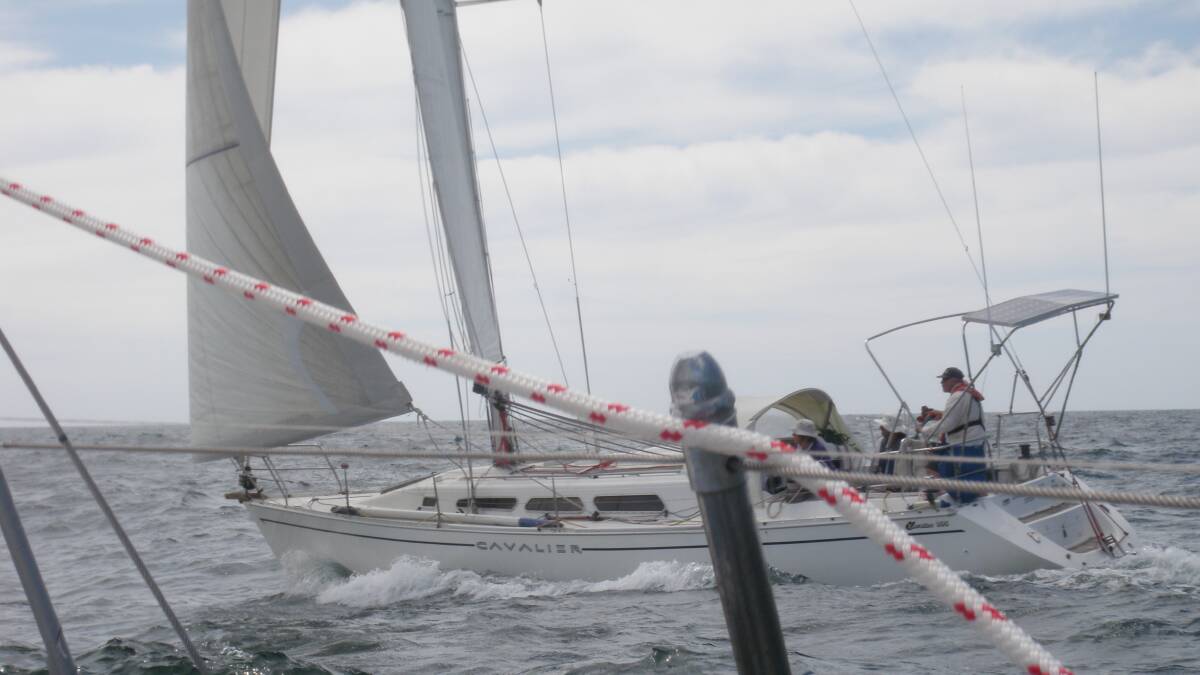 Leading the way: Cavalier Express surges ahead in Sunday’s Long Ocean Race.