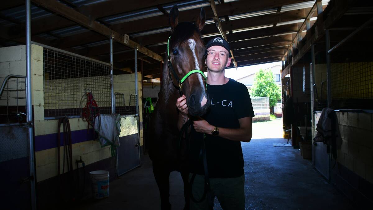 Outside chance: Matt McCudden and Secrets No More ahead of the Queen of the North at Port Macquarie Race Club on January 22.