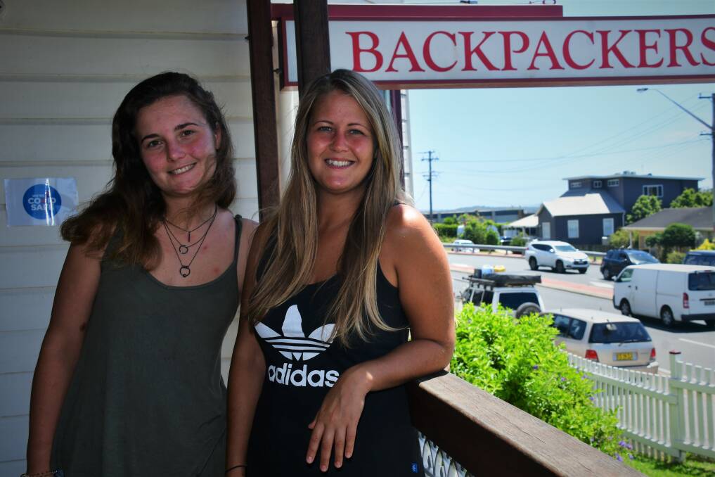 Uncertain times: Martyna Ciecielag and Natalie Schell at the Port Macquarie Backpackers.