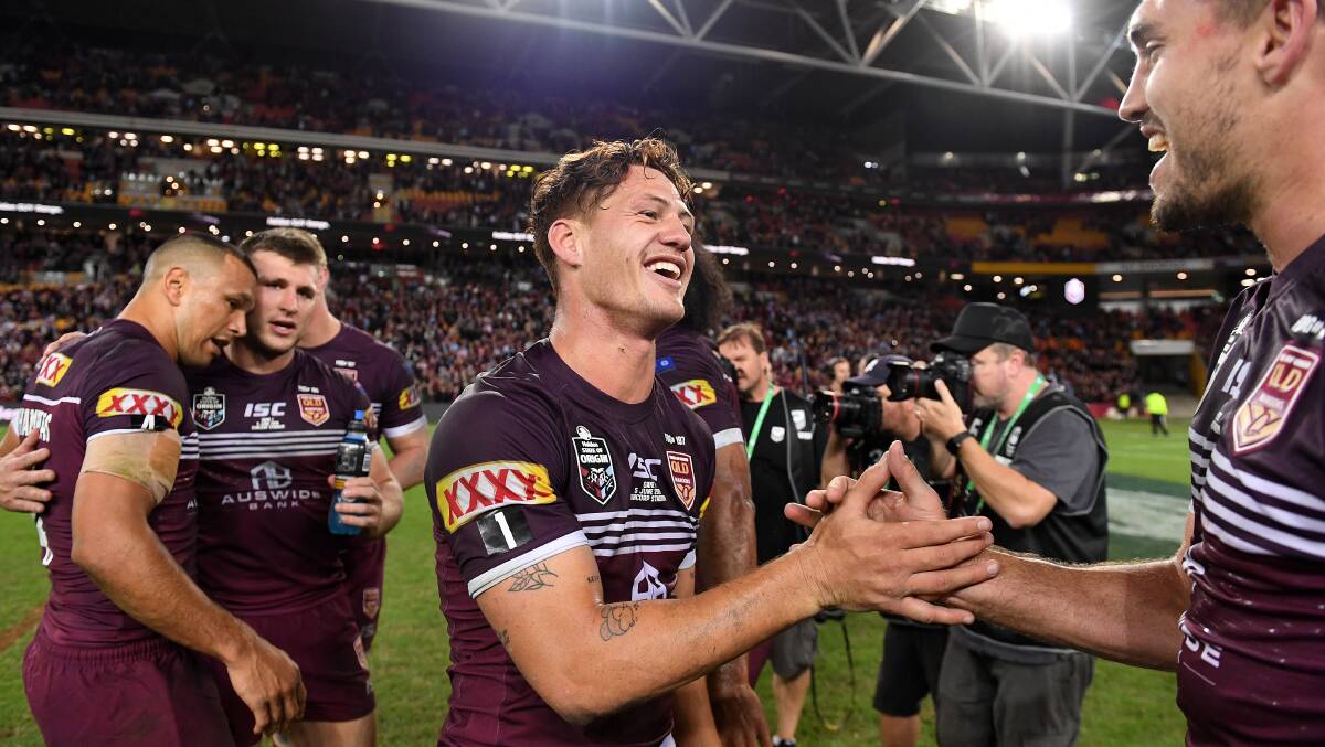 Superstar: Kalyn Ponga celebrates after full-time after Queensland took an early 1-0 State of Origin series lead. Photo: AAP/Dave Hunt