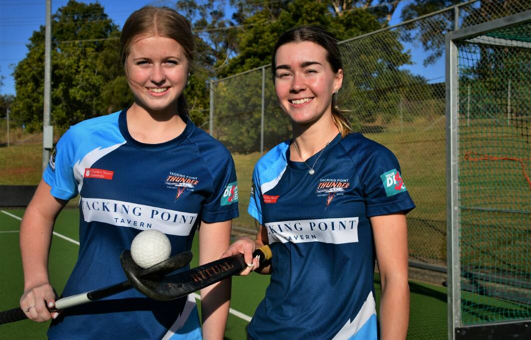 All on the line: Zara Ferguson and Sophie Collings hope Port Thunder can return from Taree with a women's Mid North Coast Hockey League premiership. Photo: Paul Jobber