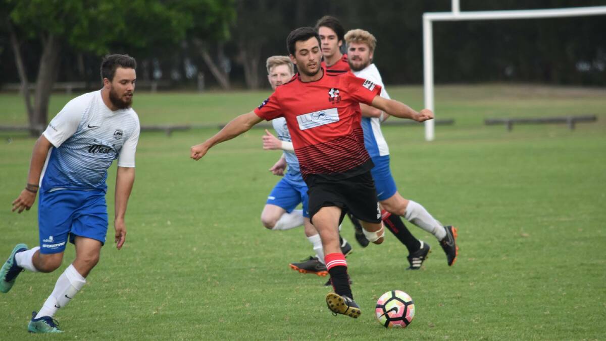 On the scoresheet: Rob Holland scored twice as Camden Haven Redbacks progressed to the third round of the FFA Cup on Sunday.