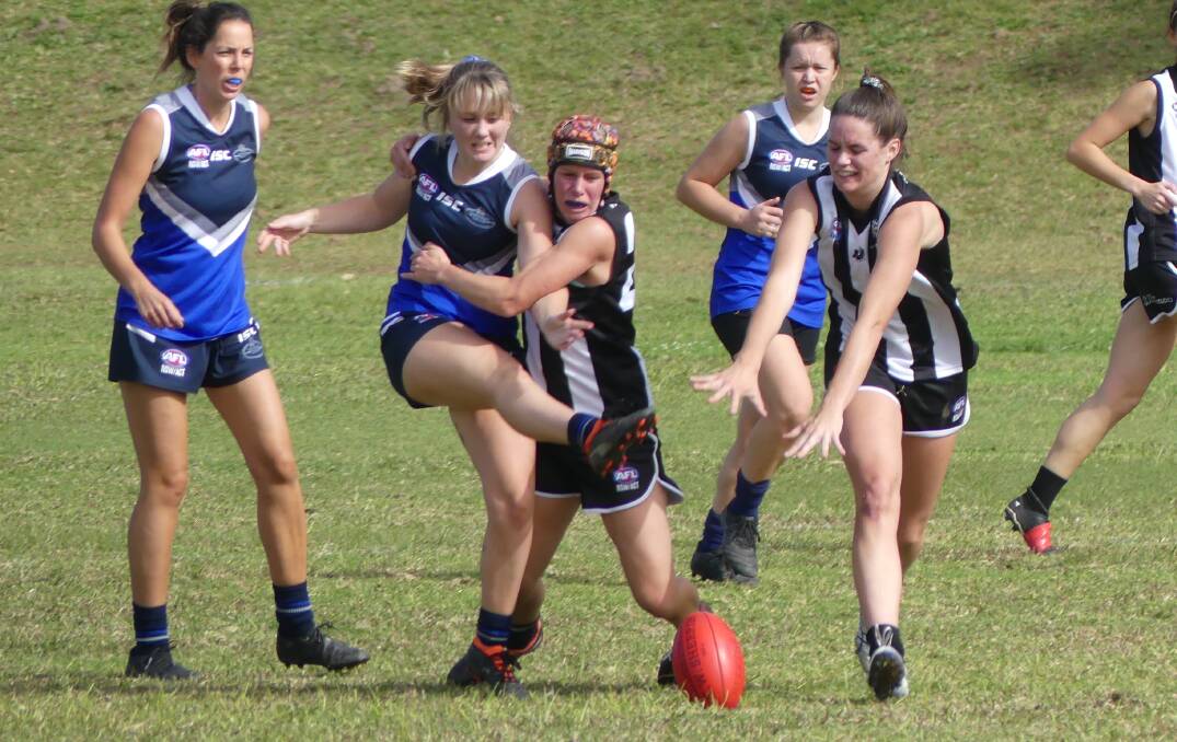 Hard work: Cambridge McCormick (right) attempts a smother in the Magpies win over Northern Beaches/Grafton. Photo: supplied
