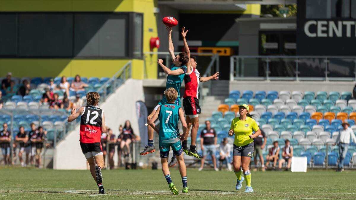 Fresh start: Coffs Harbour and Sawtell play in the under-17 AFL North Coast grand final at the newly redeveloped C.Ex Coffs International Stadium on Saturday. Photo: Dean Kirby