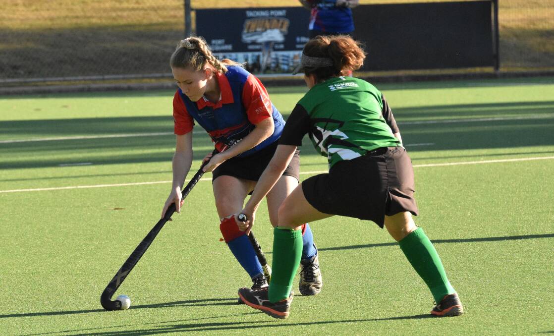 Hard work: Amy Winterton takes on the Port City defence in Wauchope's 4-3 extra-time win on Saturday. Photo: Rob Dougherty