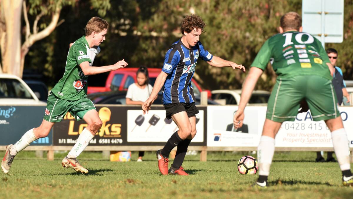 Into the mixer: Port Saints midfielder Griffin Goodman prepares to put in a cross during Kempsey Saints.