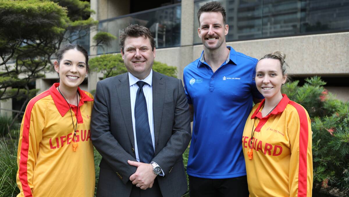 Familiar face: James Magnussen (second from right), Michael Ilinsky with lifeguards Nikki and Louise. Photo: supplied