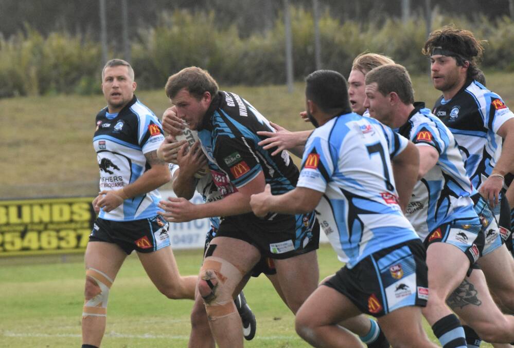 Leading the way: Mitch Smith was a standout for Port Sharks in their 36-16 loss to Port City on Saturday. Photo: Tracey Fairhurst