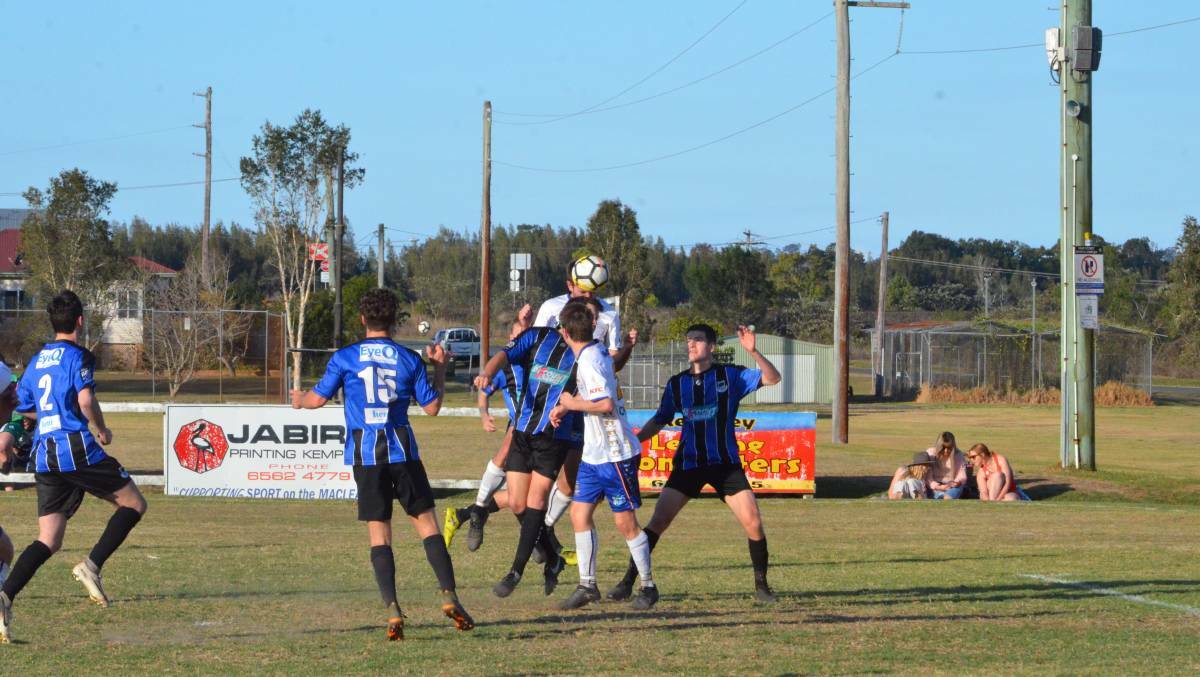 Use your head: Port Saints and Macleay Valley Rangers players jostle for possession in last year's semi-final series. Photo: Penny Tamblyn