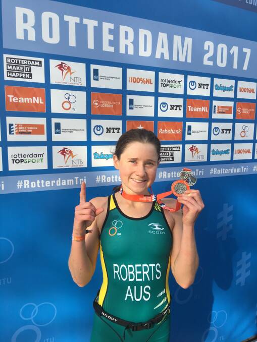 Proud as punch: Port Macquarie triathlete Madi Roberts is a world champion. Photo: Triathlon Australia