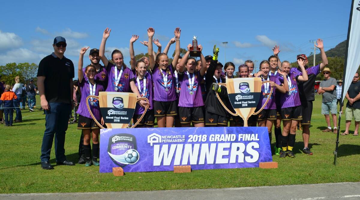 History-making: Western Phoenix all-girls team claimed the under-12 Football Mid North Coast division with a 3-0 win over Macleay Valley. Photo: supplied