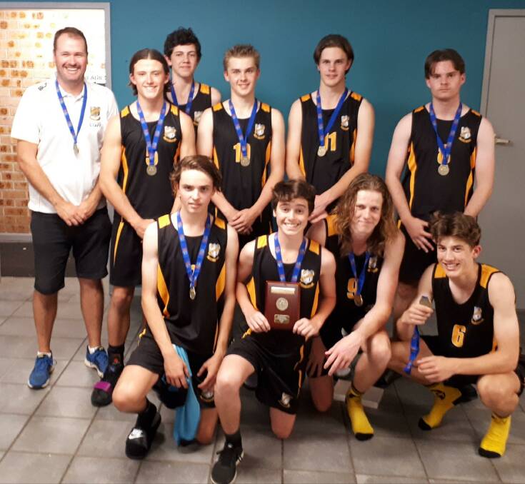 Winners: MacKillop College year 9/10 boys team are the NSW CCC basketball champions. Photo: supplied