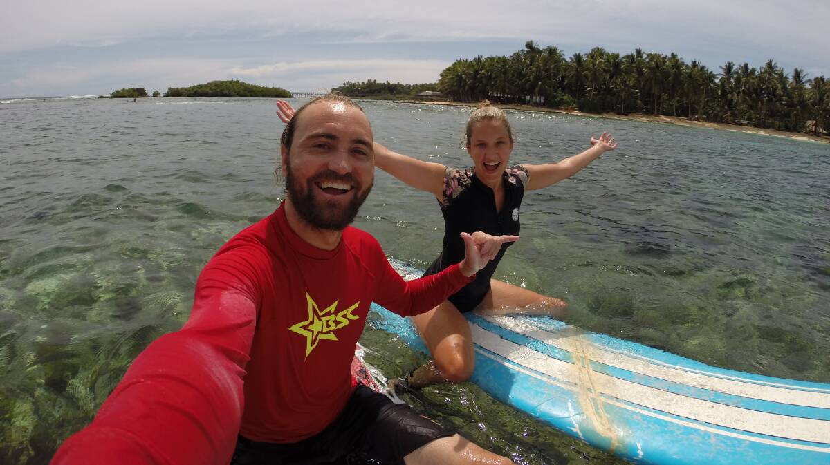 Dylan with partner Jen Sarsfield in the Philippines in 2019.