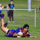 Wauchope winger Nelson Young crosses for one of his three tries on Saturday. Photo: Lighthouse Sports Photography