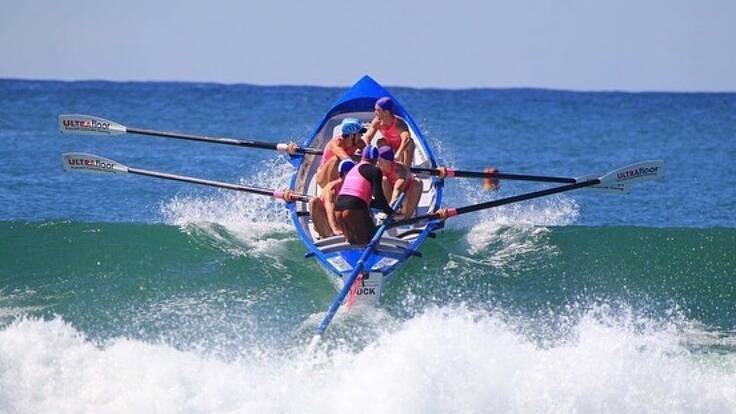 Over you go: Wauchope-Bonny Hills under-23 men's crew head out at Blacksmiths Beach. Photo: supplied