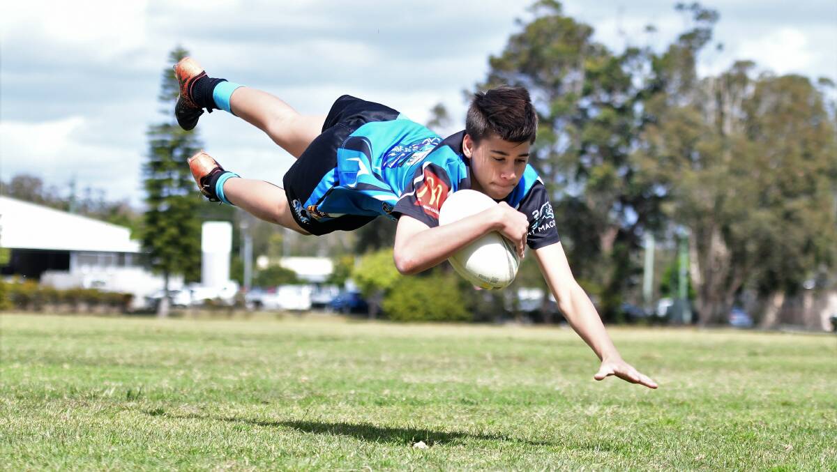 Try time: Tana Hona could have scored the best junior rugby league try this season, but he needs your help. Photo: Paul Jobber