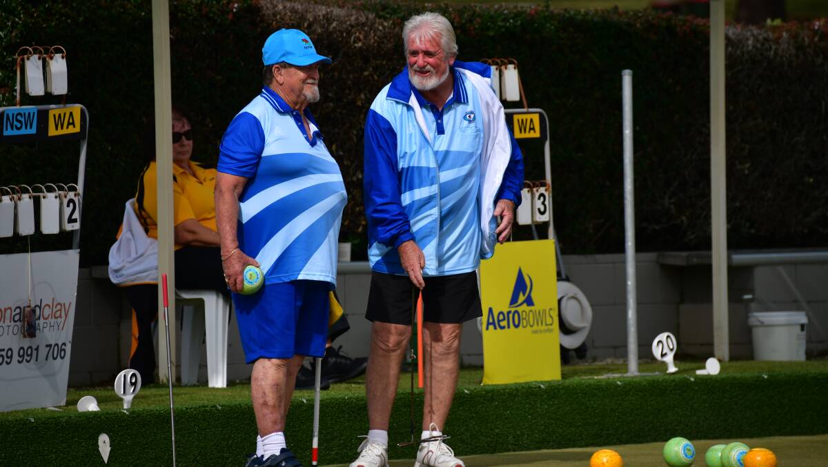 Going well: Max Glasse and Chris Thornton share a laugh during the blind bowlers titles in Port Macquarie. Photo: Paul Jobber