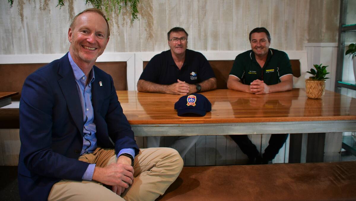Newcastle Jets chief executive Shane Mattiske, Football Mid North Coast chairman Lance Fletcher and Nationals Member for Cowper Pat Conaghan on Friday. Photo: Paul Jobber
