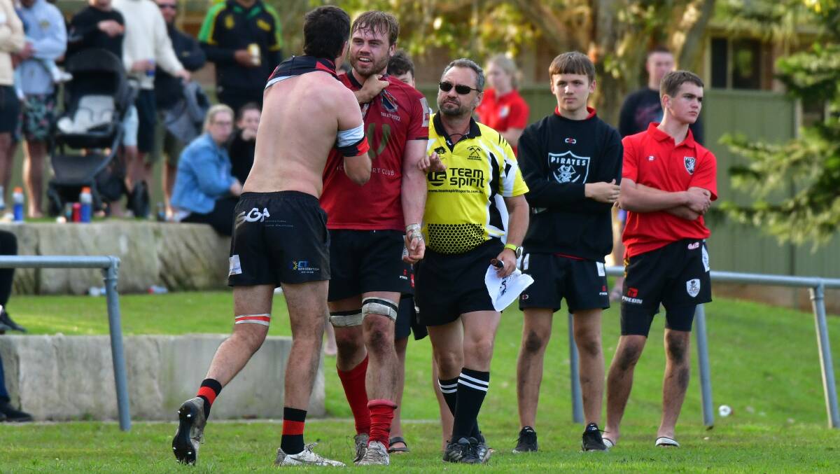 Paddy Olver exchanges words with his Coffs Harbour opponent. Photo: Paul Jobber