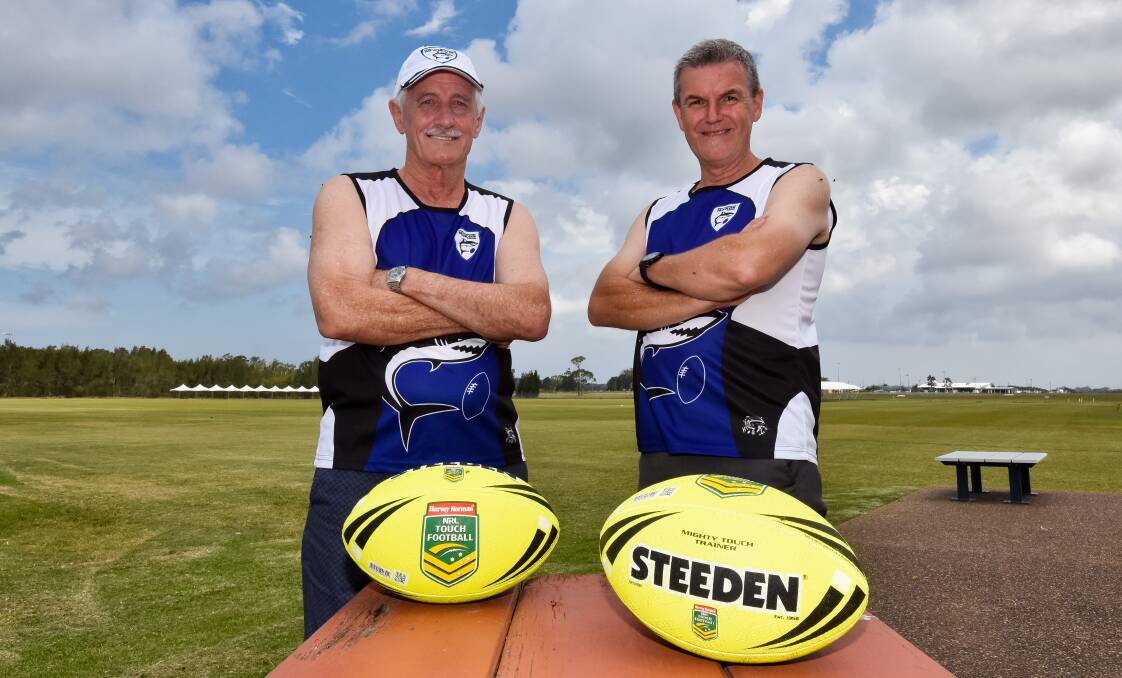 For love of the game: Two of Port Macquarie touch football's longest-serving stalwarts John Bell and Wayne Prince. Photo: Ivan Sajko