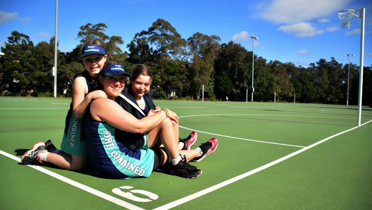 Green lights: Millie Williams, Sarah Gormley and Ruby Williams are ready to hit the courts at Macquarie Park on Saturday. Photo: Paul Jobber