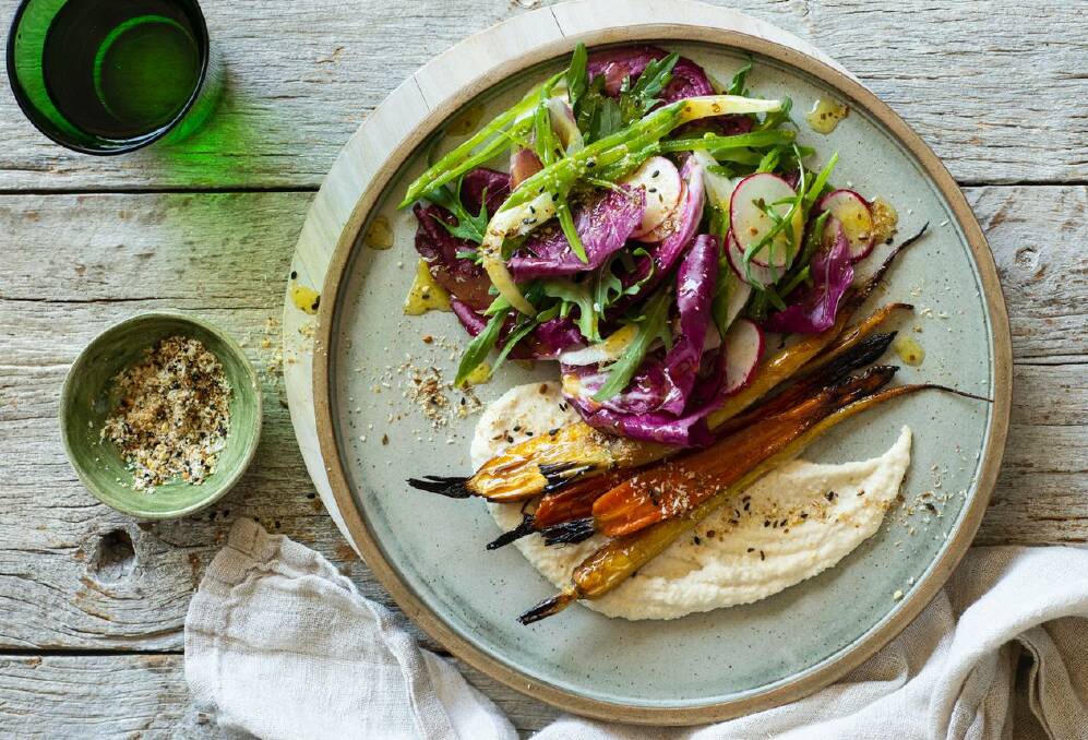 Heirloom spring carrots with almond-tahini purée and coconut dukkah. Picture: Alan Benson
