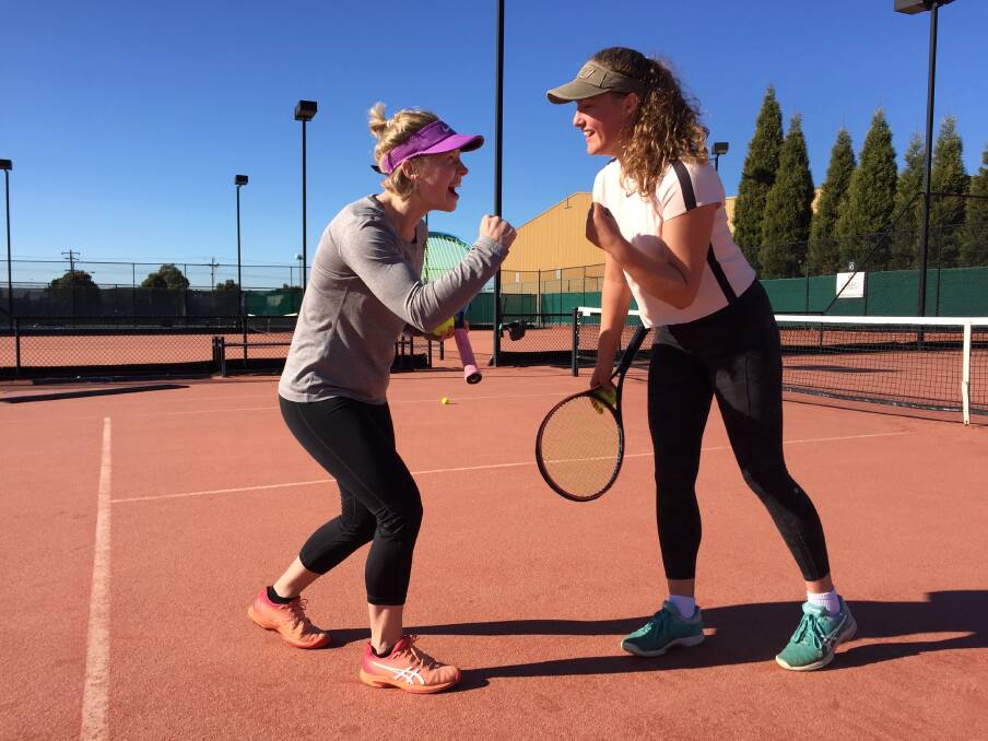 CHEERING: Ballarat tennis players Marleen Gort and Milla Fraser are pumped ahead of Ash Barty's Wimbledon singles final on Saturday night.