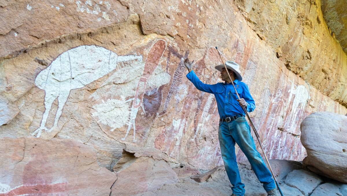 Johnny Murison takes a rock art tour in Quinkan Country. Picture: Michael Turtle 