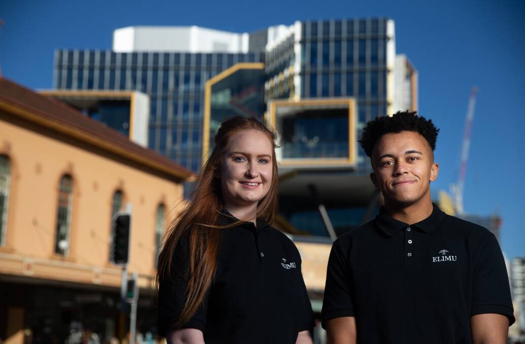 Online idea: Elimu founders Chris Kimani, right, and Tayla Furey in Newcastle. Picture: Marina Neil 