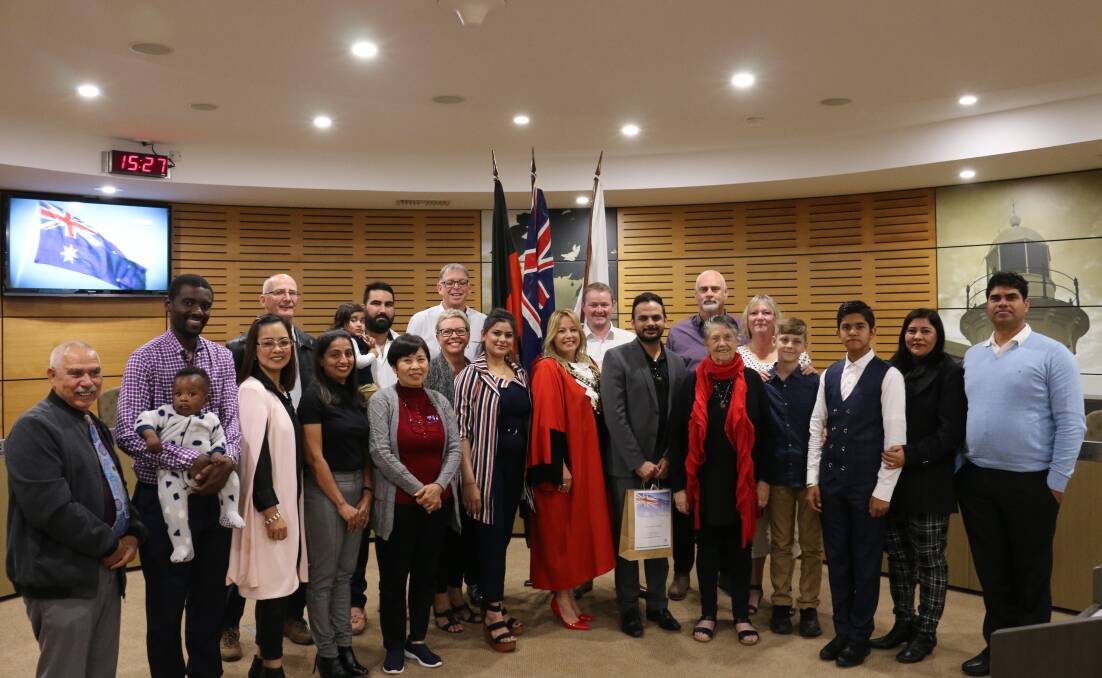 EXCITED: New citizens of Port Macquarie-Hastings after their citizenship ceremony. PHOTO: Brent Ryan