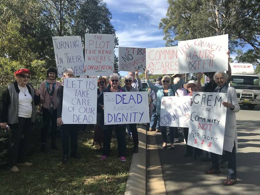 NOT HAPPY: Protestors outside the crematorium in Port Macquarie.