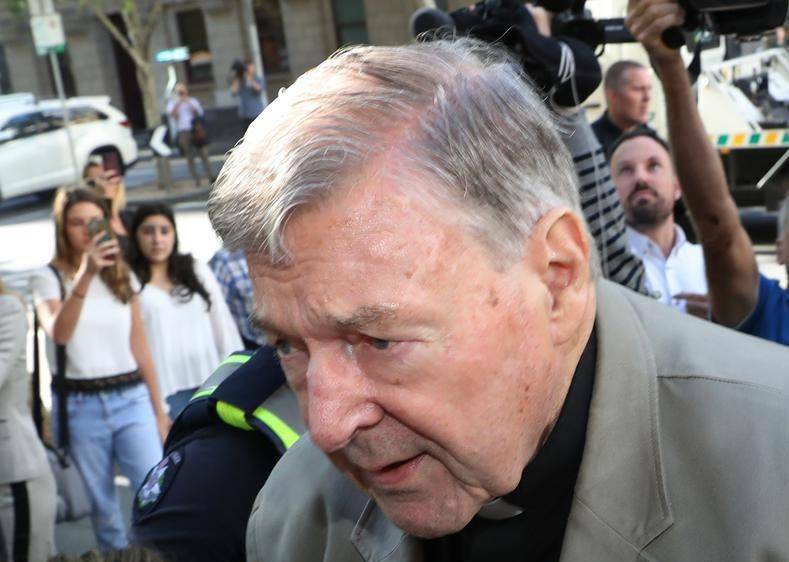 George Pell outside court. 