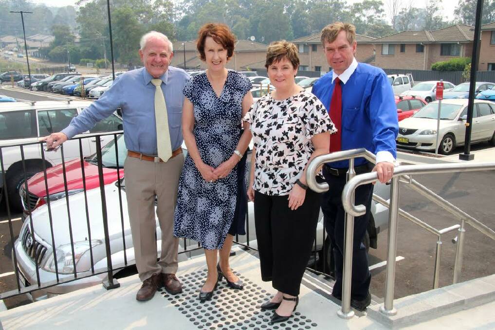 ALL SMILES: Mid North Coast Local Health District Governing Board chair Warren Grimshaw, Port Macquarie MP Leslie Williams, Port Macquarie Base Hospital director of Nursing and Midwifery Penelope Pink and MNCLHD chief executive Stewart Dowrick celebrate the opening of the new staff car park. Photo: Lynn Lelean