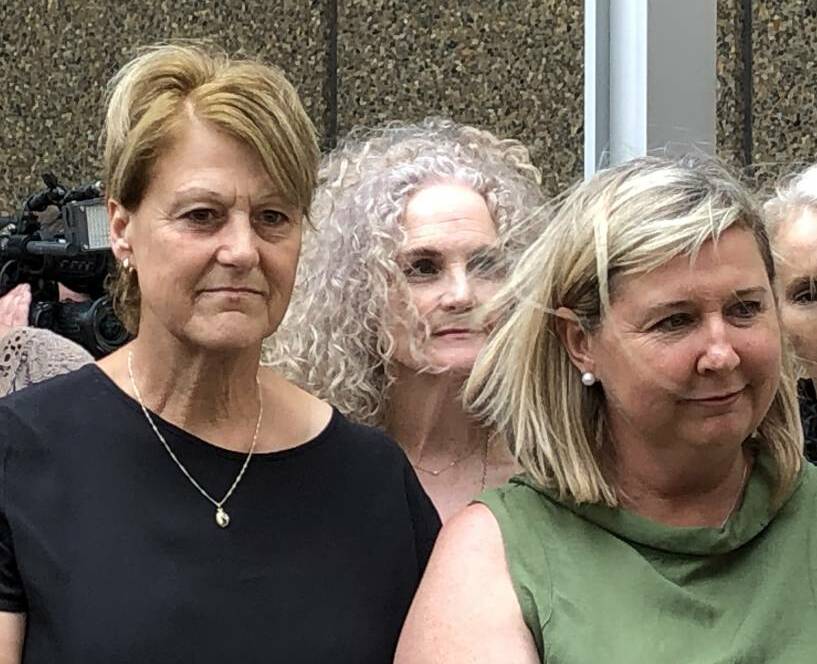 FIGHTERS: Lead claimants in the Johnson & Johnson class action, Diane Dawson (left) and Kathryn Gill outside the Federal Court following Thursday's landmark win. Photo: Newcastle Herald.
