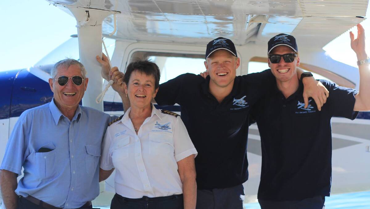 FRIENDS: Bill Lane (Australia's most experienced seaplane pilot), Judy and two pilots she trained Rhett shillaw and Liam Hill. PHOTO: Ruth Hodge

